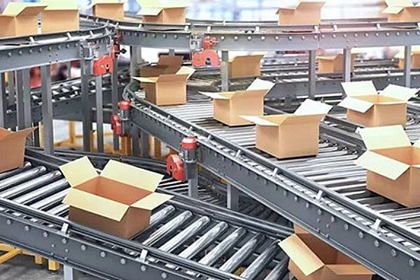 Electrical Insulation Materials: Open boxes on automatic conveyor systems